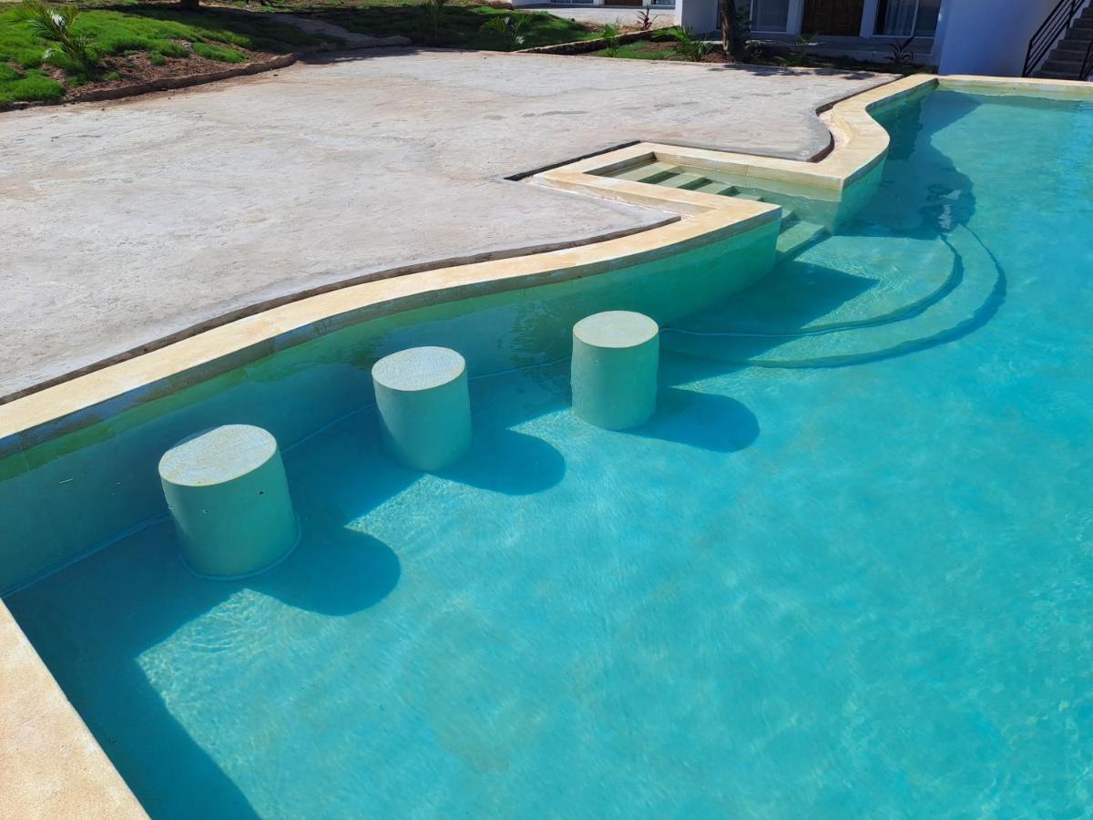 Cave Diani Holiday Apartments Diani Beach Esterno foto